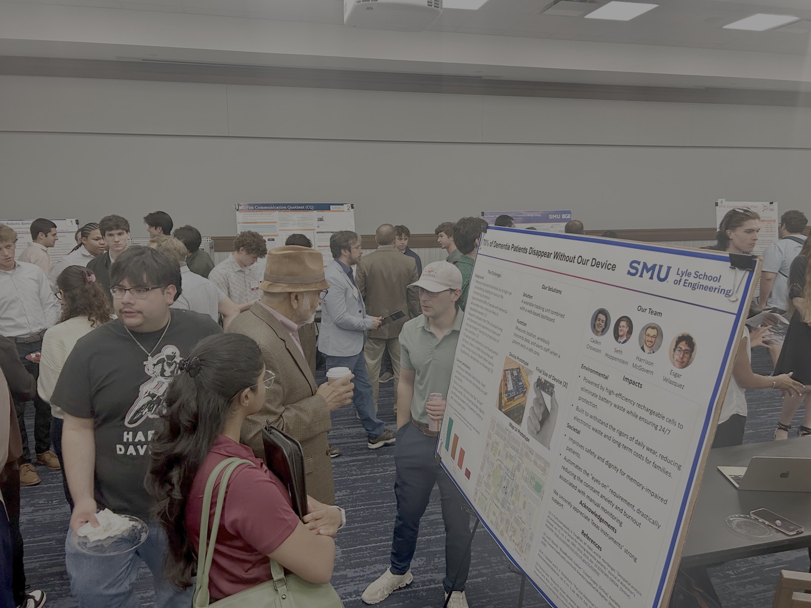 The team's poster and demonstration table at the Expo